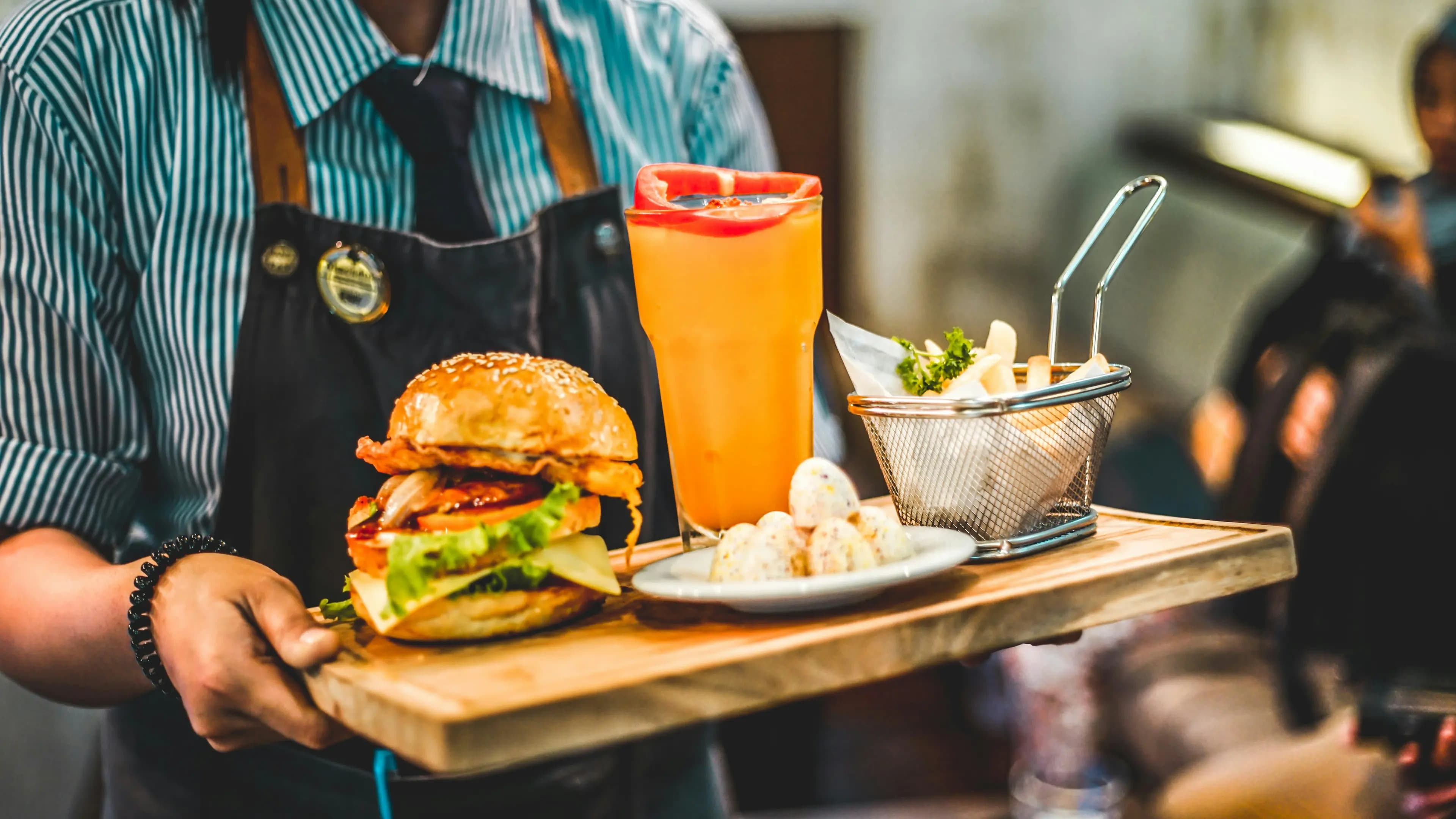 UK · well-known burger group · 39 sites · 85% first-time diners